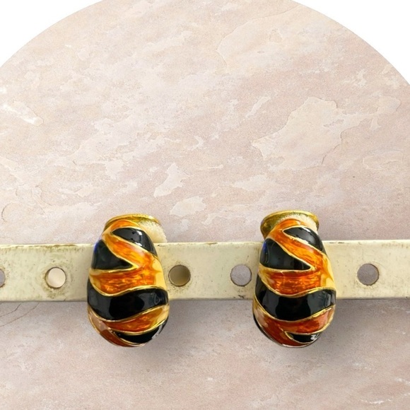 Kenneth Jay Lane Gold Tiger Stripe Half Hoop Enamel Clip
Earrings - Picture 1 of 12